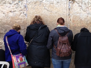 Student Katie Hartwell and McCormick staff Lisa Dagher praying with other women at the Western Wall. 